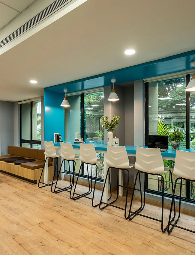 Project Odessa: Modern office space with windows, minimalist design, sleek furnishing, and a bright, professional atmosphere.
